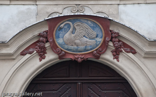 House sign 'At the White Swan' on Nerudova