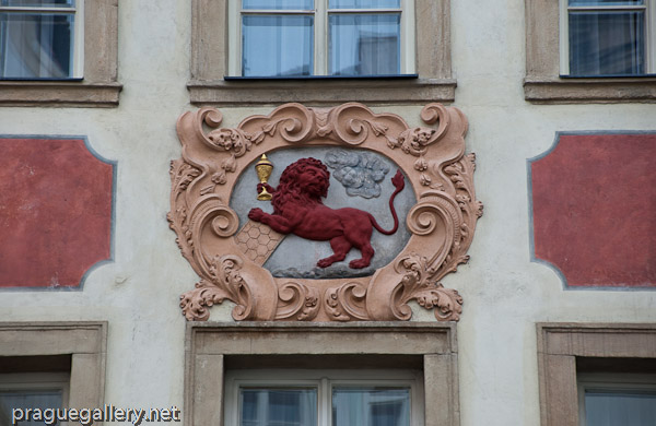 House sign 'At the Red Lion' in Nerudova